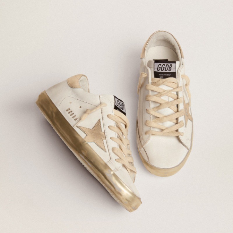 Women's Super-Star with gold sparkle foxing and metal stud lettering sneakers Size 7